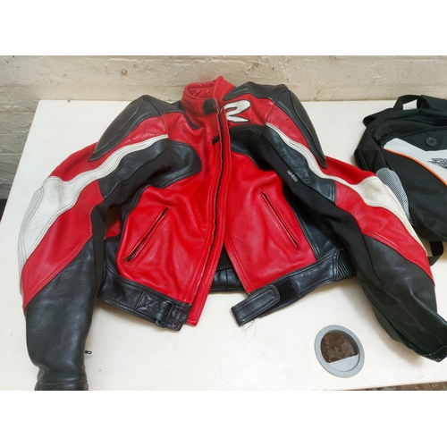 1266 - Two items, one Harley Davidson Motorcycles rucksack and one Trent Thomas leather motorcycle jacket, ... 