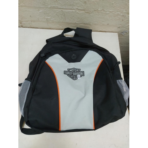 1266 - Two items, one Harley Davidson Motorcycles rucksack and one Trent Thomas leather motorcycle jacket, ... 