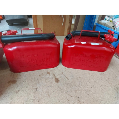 1267 - Four red metal petrol cans