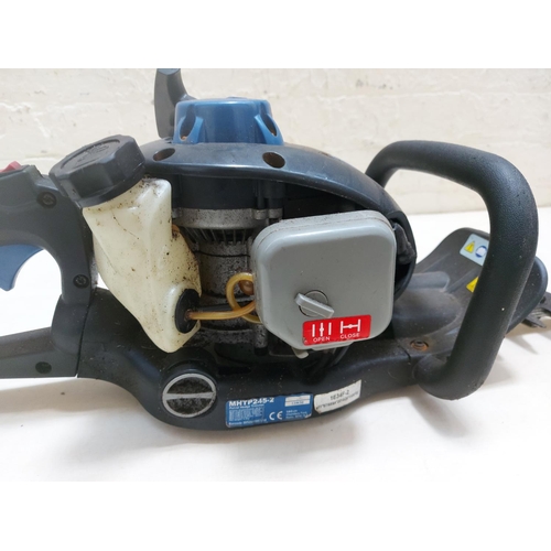 1273 - A black and grey Mac Allister MHTP245.2 petrol hedge trimmer with 24