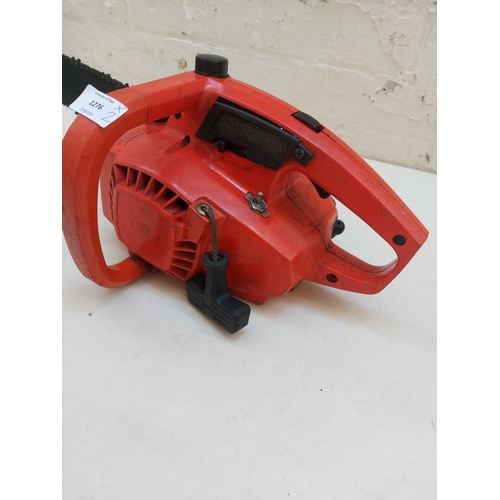 1276 - Two items, one orange Remington Yardmaster 1 petrol chainsaw with 12