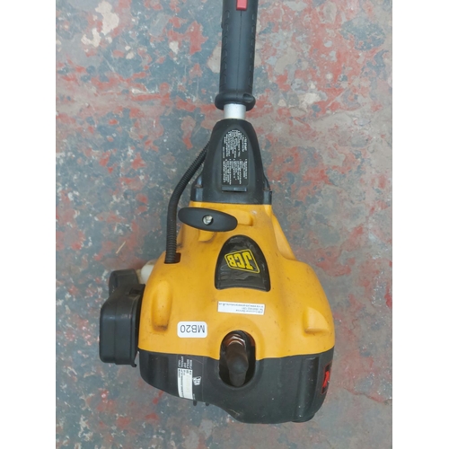 1280 - A black and yellow JCB M25 petrol strimmer