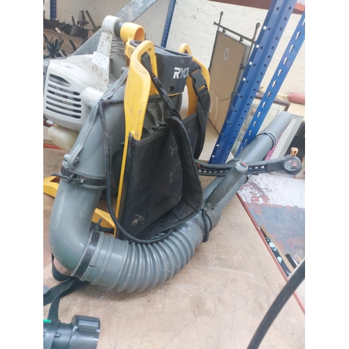 1287 - Two items, one yellow and grey Ryobi RBL30BPT petrol rucksack leaf blower and one green petrol can