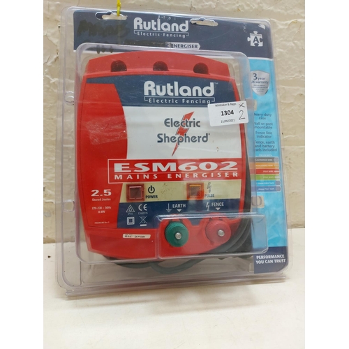 1304 - Two items, one Rutland model ESM602 electric fence energizer and one 12v portable power system