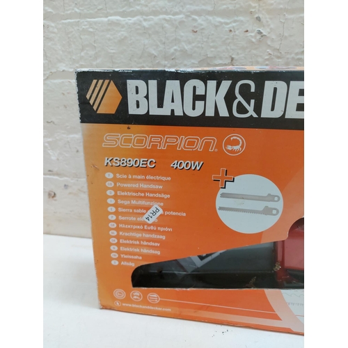 1307 - A boxed orange Black & Decker KS890EC scorpion saw