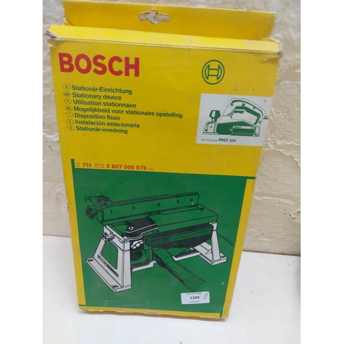 1309 - Various Bosch products, boxed PHO100 planer, PSS23 flatbed sander, unboxed PHG500-2 hot air gun etc.