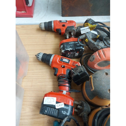 1324 - Ten mains electric and cordless power tools to include one black and red Black & Decker DPC12 cordle... 