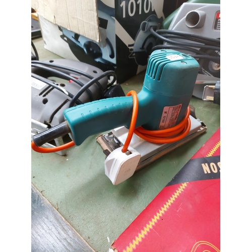 1341 - A mixed lot to include one green Bosch PKS46 hand held electric circular saw, one blue Black & Decke... 