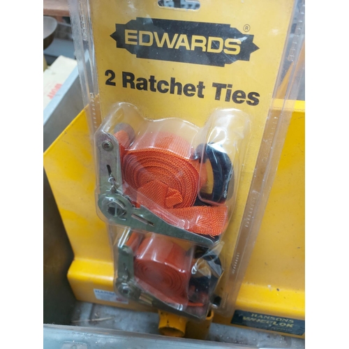 1345 - Two boxes containing new Edwards ratchet straps, caravan wheel lock, auto stores, 6amp 6/12v battery... 