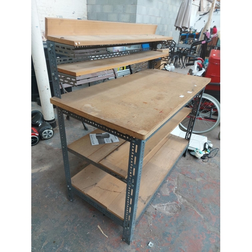 1352 - A wood and metal work bench - approx. 1.30m high x 1.30m wide x 64cm deep