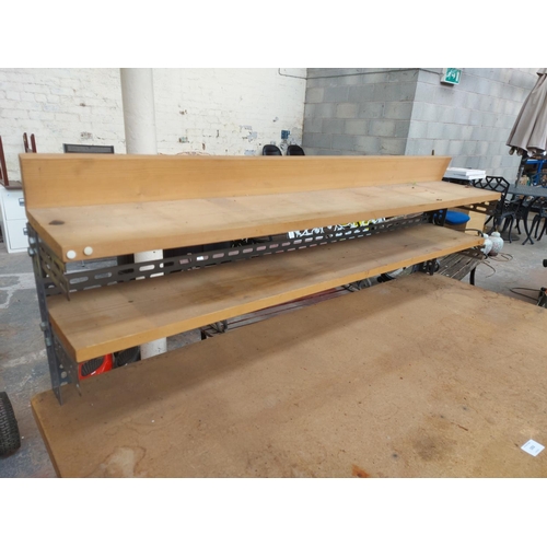 1352 - A wood and metal work bench - approx. 1.30m high x 1.30m wide x 64cm deep