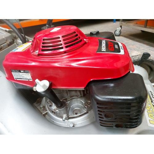 1356 - A red and silver Lawn Flight Pro 553 HRS petrol lawn mower with Honda GXP160 engine and grass collec... 