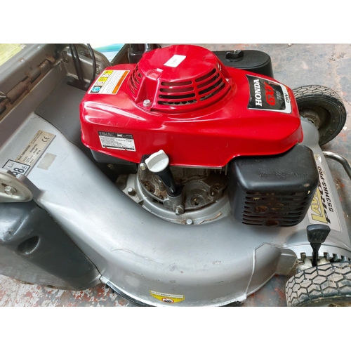 1357 - A red and silver Lawn Flight Pro 553 HRS petrol lawn mower with Honda GXP160 engine and grass collec... 