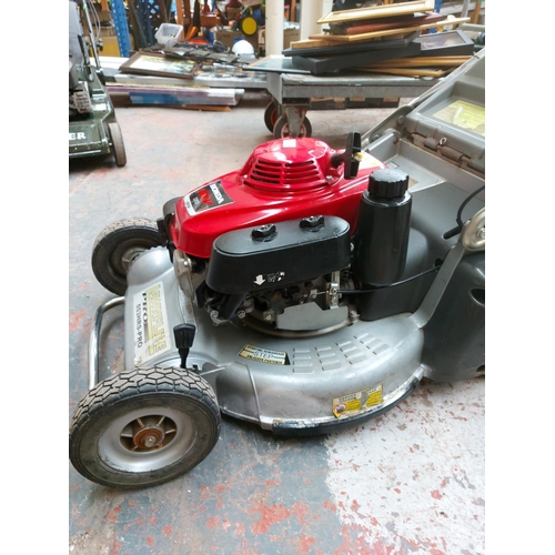 1357 - A red and silver Lawn Flight Pro 553 HRS petrol lawn mower with Honda GXP160 engine and grass collec... 