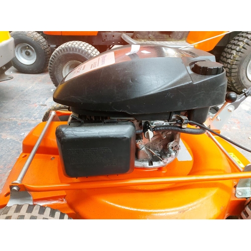 1358 - An orange and black Husqvarna LD553S professional petrol lawn mower with Honda GCV170 engine