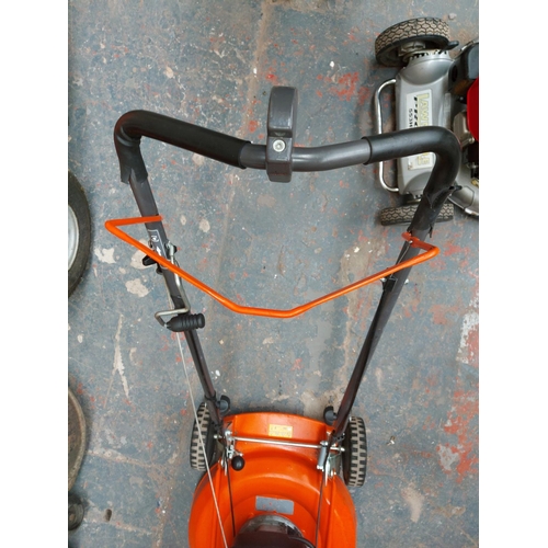 1358 - An orange and black Husqvarna LD553S professional petrol lawn mower with Honda GCV170 engine