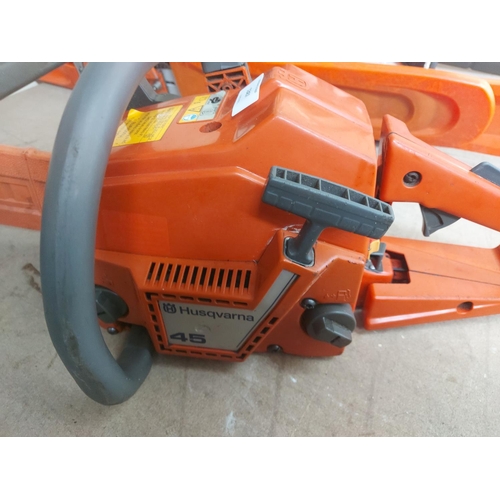 1367 - An orange and grey Husqvarna 45 petrol chainsaw with 15