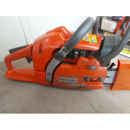 1368 - An orange and grey Husqvarna 350 petrol chainsaw with 17