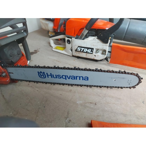 1368 - An orange and grey Husqvarna 350 petrol chainsaw with 17