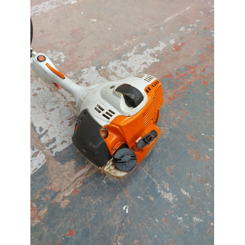 1374 - An orange and grey Stihl FS40-c petrol strimmer