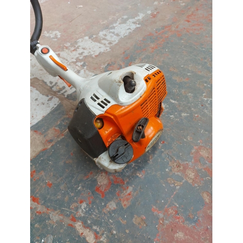 1375 - An orange and grey Stihl FS40-c petrol strimmer