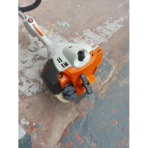 1377 - An orange and grey Stihl FS40-c petrol strimmer