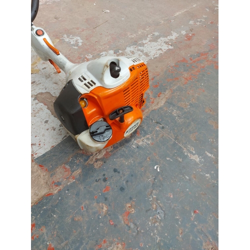 1378 - An orange and grey Stihl FS40-c petrol strimmer