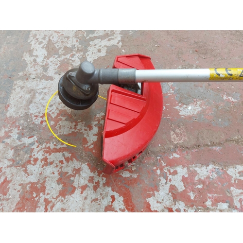 1379 - A red and grey Kawasaki KBH43A petrol strimmer