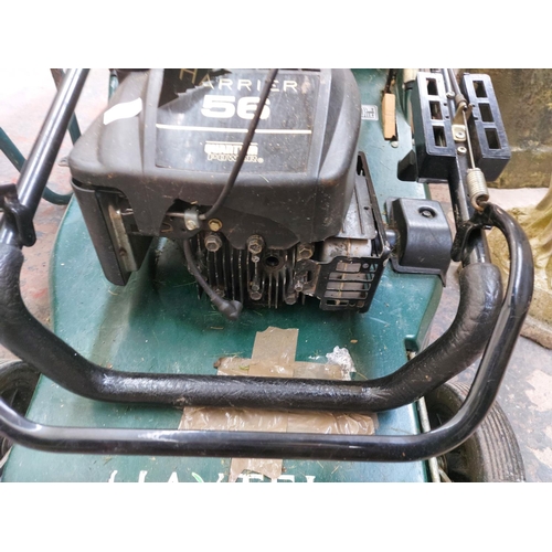 1383 - A black and green Hater Harrier 56 petrol lawn mower with grass collector