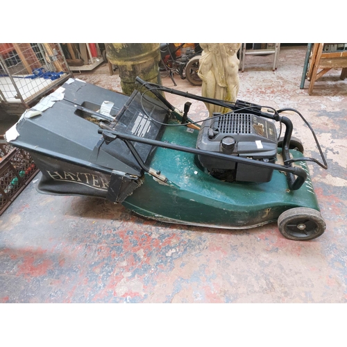 1383 - A black and green Hater Harrier 56 petrol lawn mower with grass collector