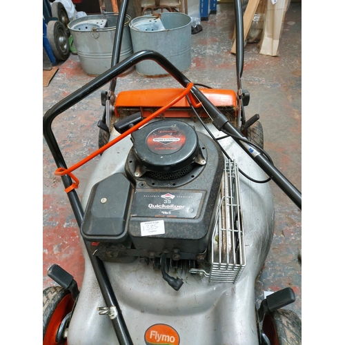 1385 - Two petrol lawnmowers for spares and repair, one black and silver Flymo Quicksilver 46S with Briggs ... 