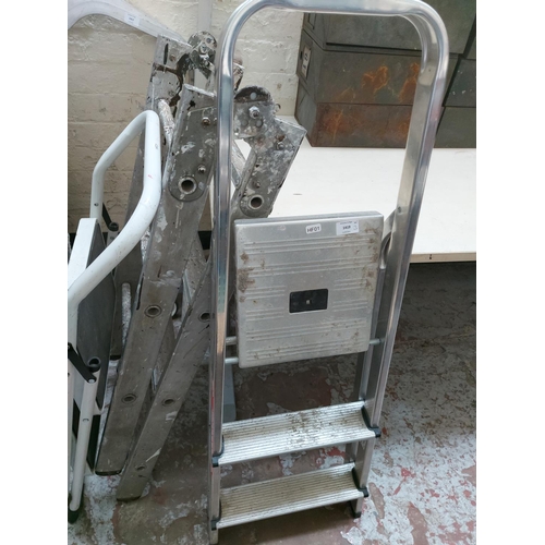 1419 - Three items, one two tread metal step ladder, one aluminium multipurpose step ladder and one three t... 