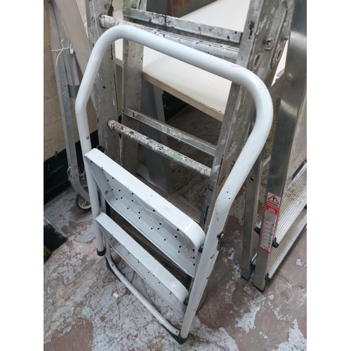 1419 - Three items, one two tread metal step ladder, one aluminium multipurpose step ladder and one three t... 