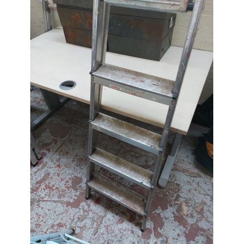 1421 - Two sets of step ladders, one three tread metal and one five tread aluminium