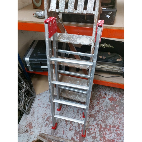 1424 - Three items, one aluminium multipurpose ladder and two sets of wooden step ladders, one three tread ... 