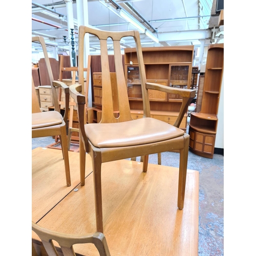 749 - A Nathan teak extending dining table and six matching chairs - approx. 75cm high x 92cm wide x 153cm... 