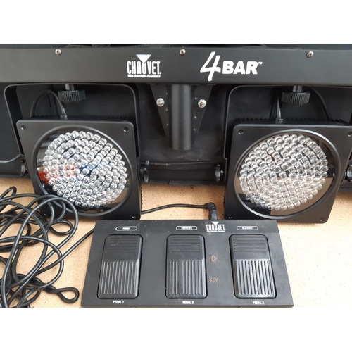 1129 - Two cased sets of Chauvet 4 Bar LED stage lights with foot controllers and bagged stands