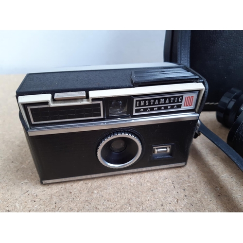 1184 - Five cased items, one Kodak Instamatic 100 camera, one Sony Cyber-shot DSC-P5 3.2mp digital camera, ... 