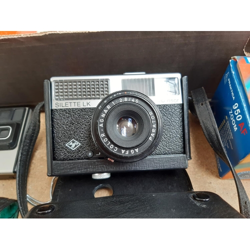 1185 - A box containing cameras and photography equipment to include Fujica Rapid D1 35mm, Olympus Trip 35,... 