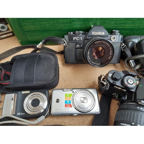 1188 - A box containing cameras and photography equipment to include boxed Fujifilm Finepix J37 12.2mp digi... 