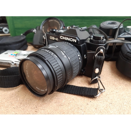 1188 - A box containing cameras and photography equipment to include boxed Fujifilm Finepix J37 12.2mp digi... 