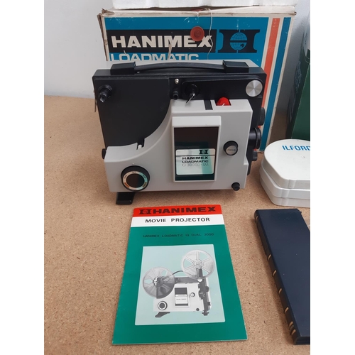 1191 - Two items, one boxed Hanimex Loadmatic IQ Dual 3000D-SM movie projector and one box of mostly empty ... 