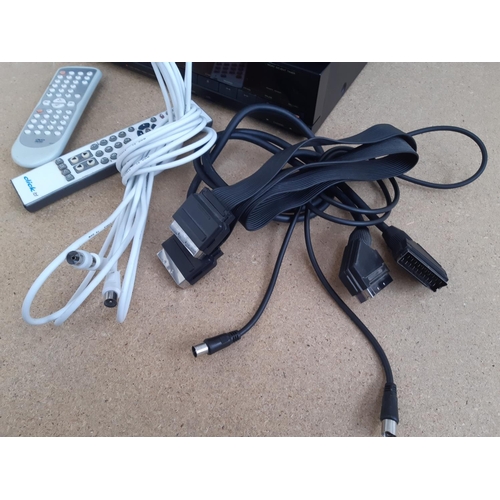 1052 - A box containing Proline 900XT twin speed VCR, Funai DBVR-7510S VCR/DVD player, selection of DVDs an... 