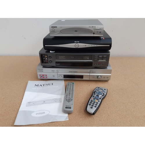 1056 - Four items of AV equipment, one Akai VS-G878 VCR, one Sky Plus HD box with remote, one Matsui DVD225... 