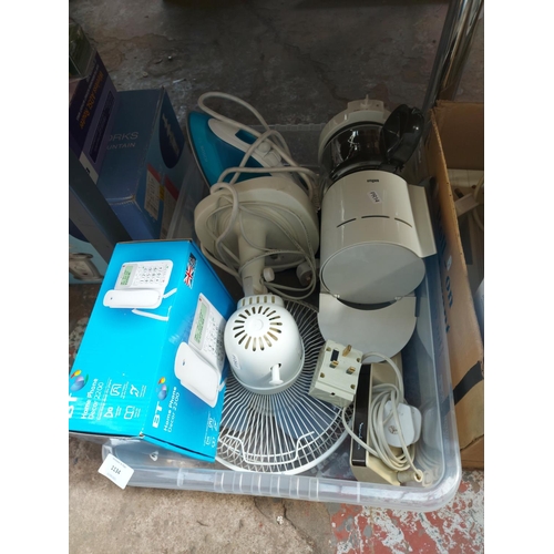 1134 - Two boxes containing Braun coffee machine, blue and white Bosch steam iron, desk fan, BT landline ph... 