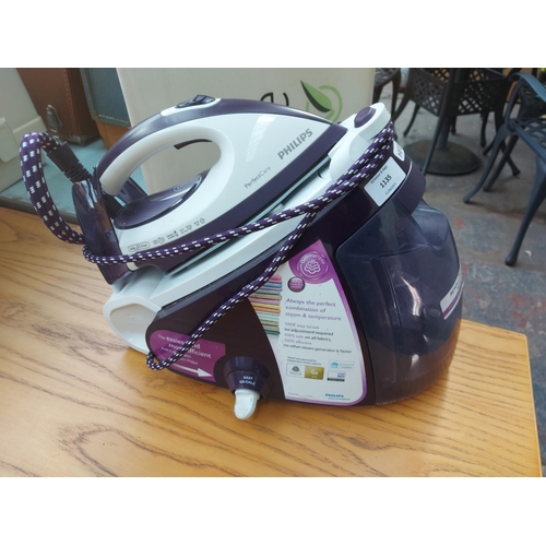 1135 - Two items, one purple and grey Philips GC9240 steam iron station and one large good quality Brabanti... 