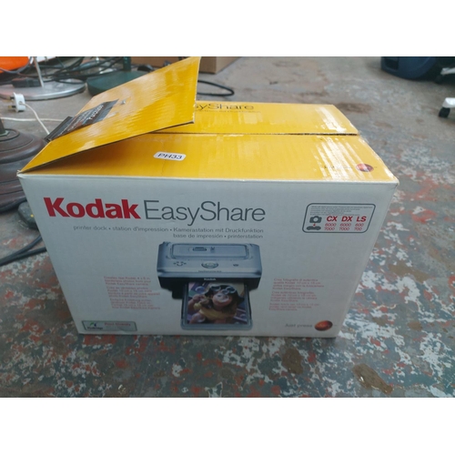 1147 - A mixed lot to include Epson V370 photo scanner, boxed Kodak EasyShare printer dock, black and chrom... 