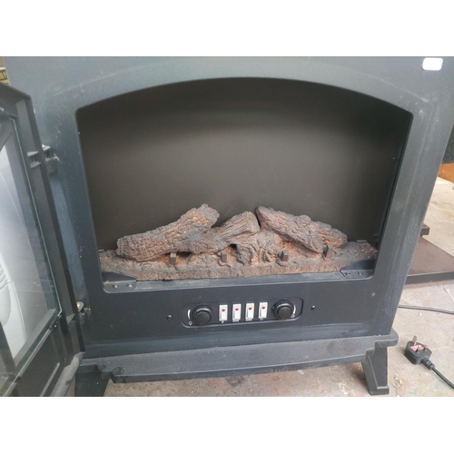 1155 - A Dunelm log burning stove effect electric fire approx. 25