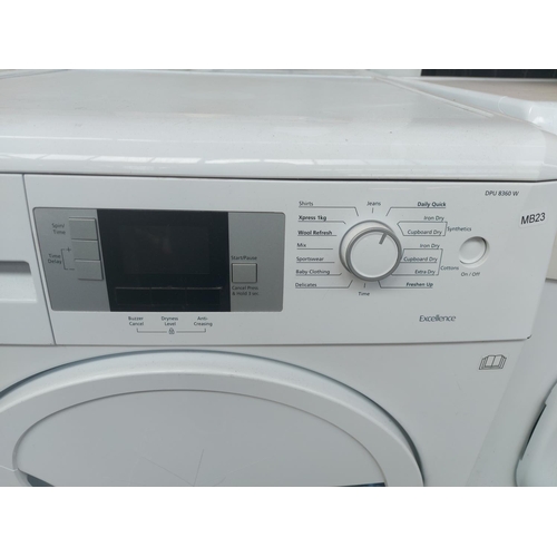 1172 - A Beko DPU8360W 8kg A+ tumble dryer