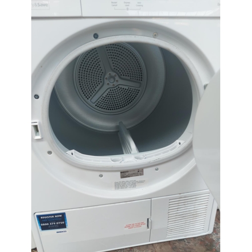 1172 - A Beko DPU8360W 8kg A+ tumble dryer